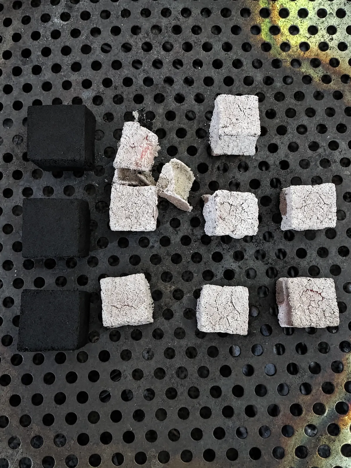 Low ash result of coconut charcoal briquettes after burning